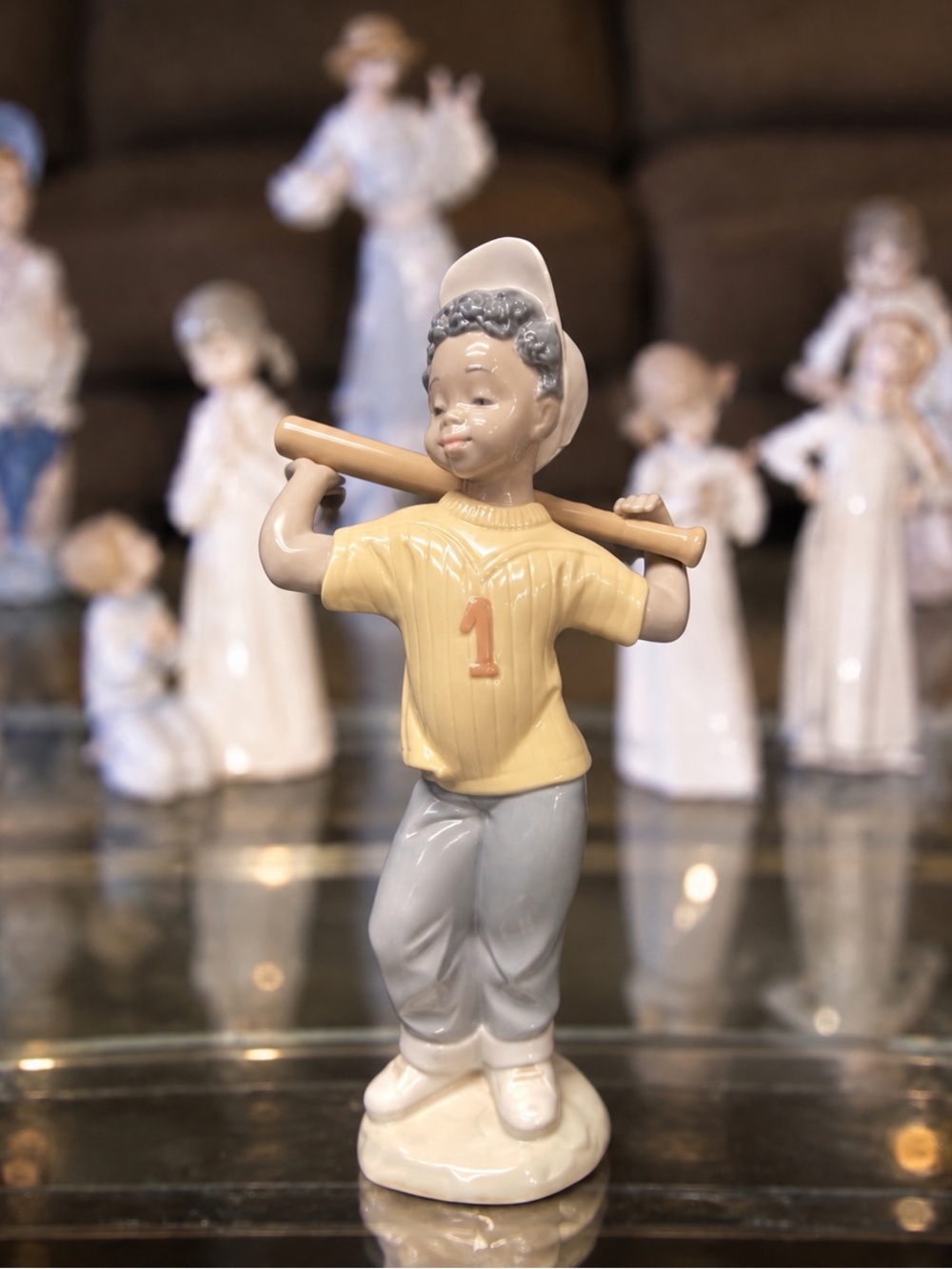 Lladro Porcelain Boy Baseball Figurine in Cream, Yellow and Gray